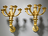 A fine pair of Restauration gilt bronze five-light wall-lights